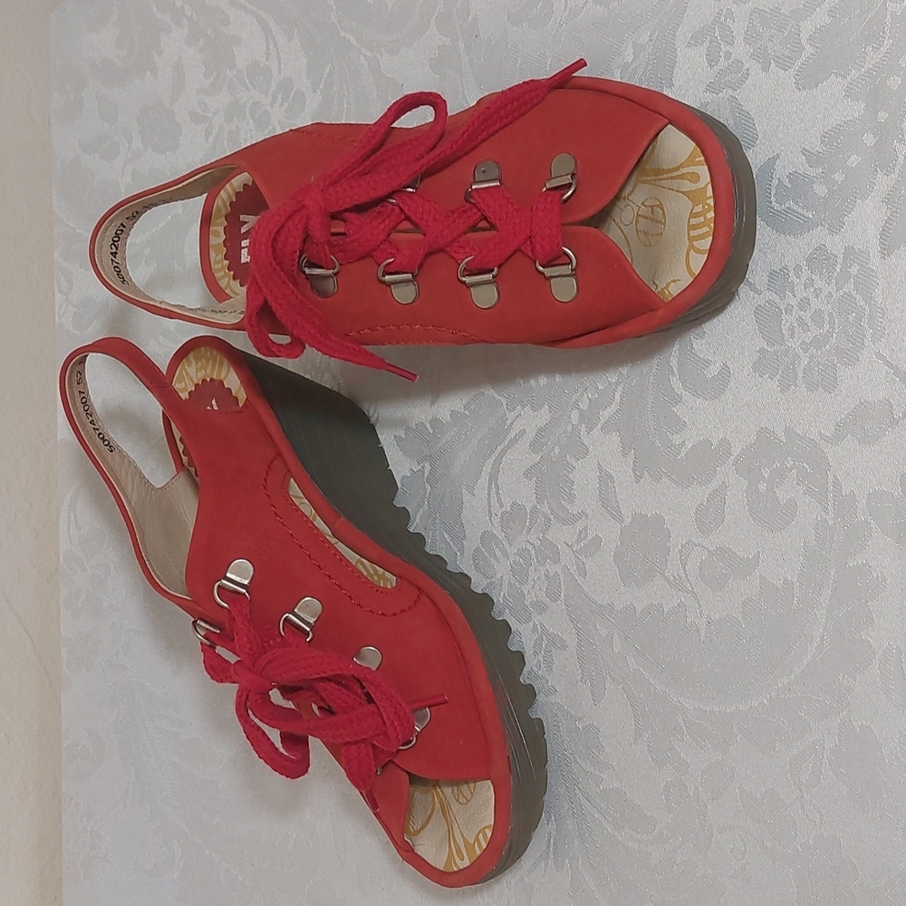 FLY LONDON Red leather wedge sandals. Size 37 which is a 6.5 NWOT